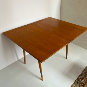 table portefeuille annees 1950 french midcentury design pieds compas bois clair assiettes couleurs table à manger extensible plateau pliant