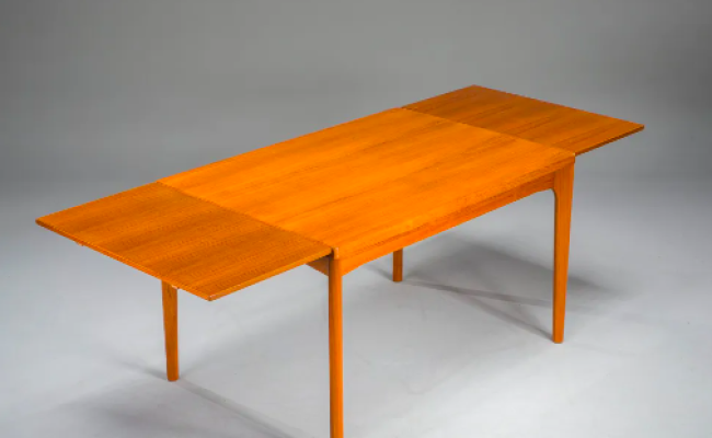 Table à manger en teck Henning Kjaernulf avec allonges intégrées – L 119(209) x P 84 x H 73 cm – 990 € soldé 850 €