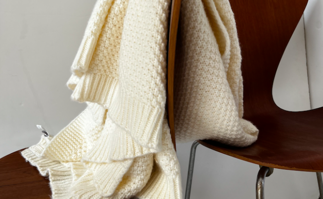 Plaid en coton/laine blanc cassé – 69 €